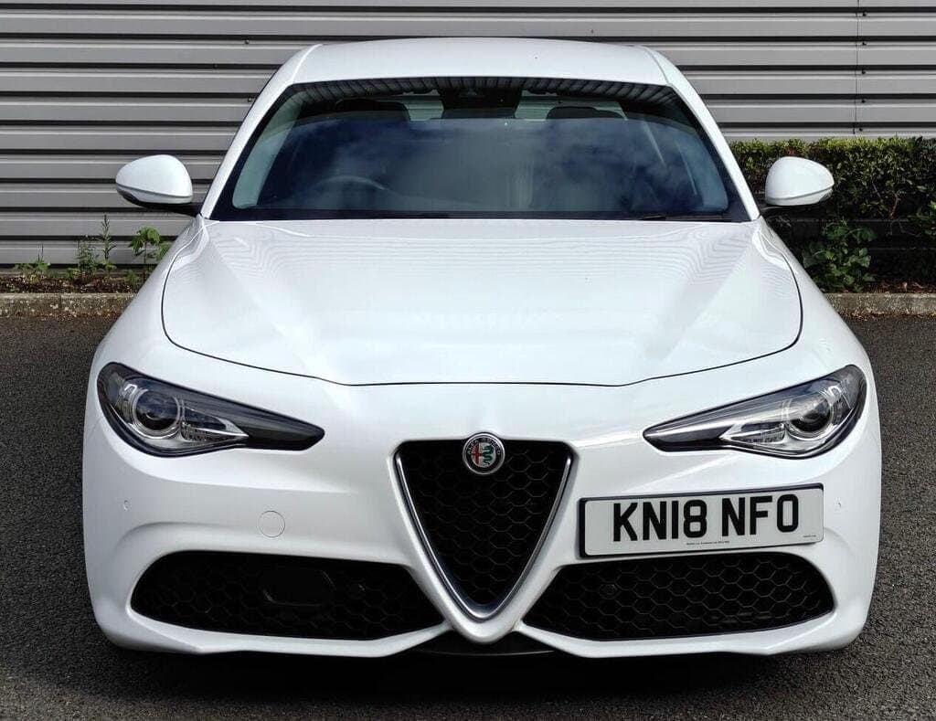 Alfa Romeo Giulia Veloce in White, three-quarter front view, closer angle