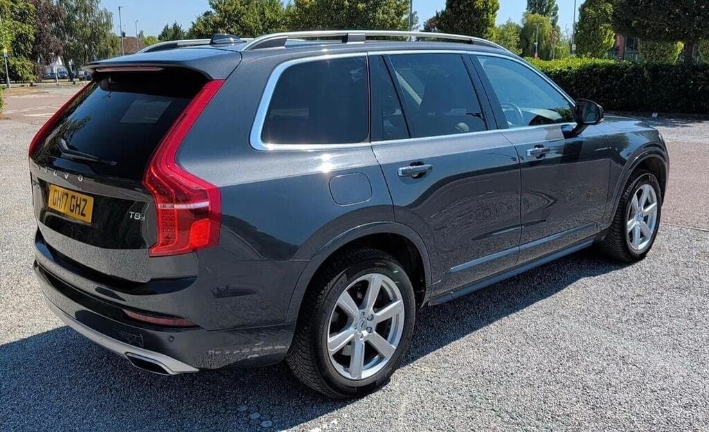 Volvo XC90 T8 in Saville Grey, rear three-quarter view, alternate angle