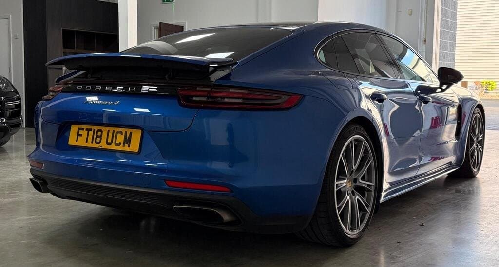 Porsche Panamera 4 E-Hybrid in Sapphire Blue, rear three-quarter view