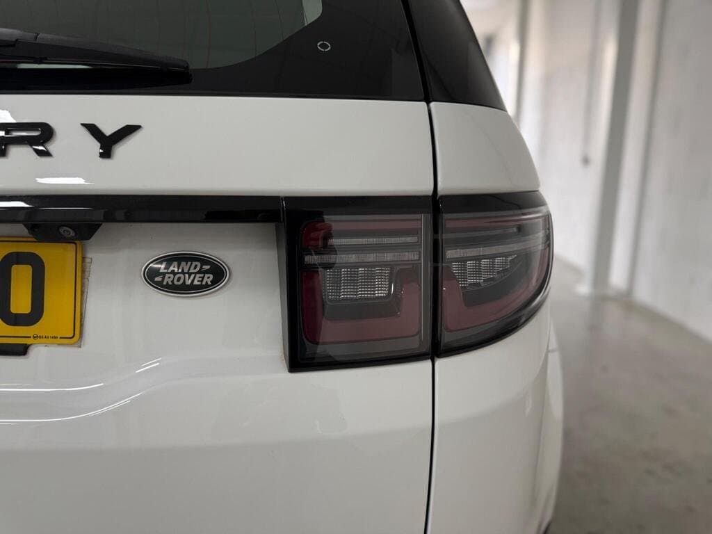 Land Rover Discovery Sport SE rear light and Land Rover badge close-up