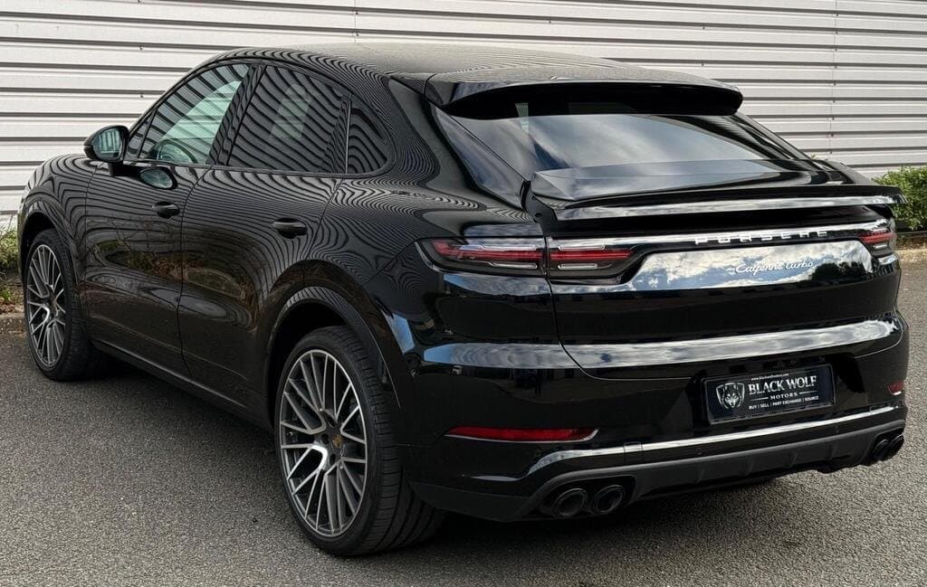 Porsche Cayenne Turbo in Black, rear three-quarter view