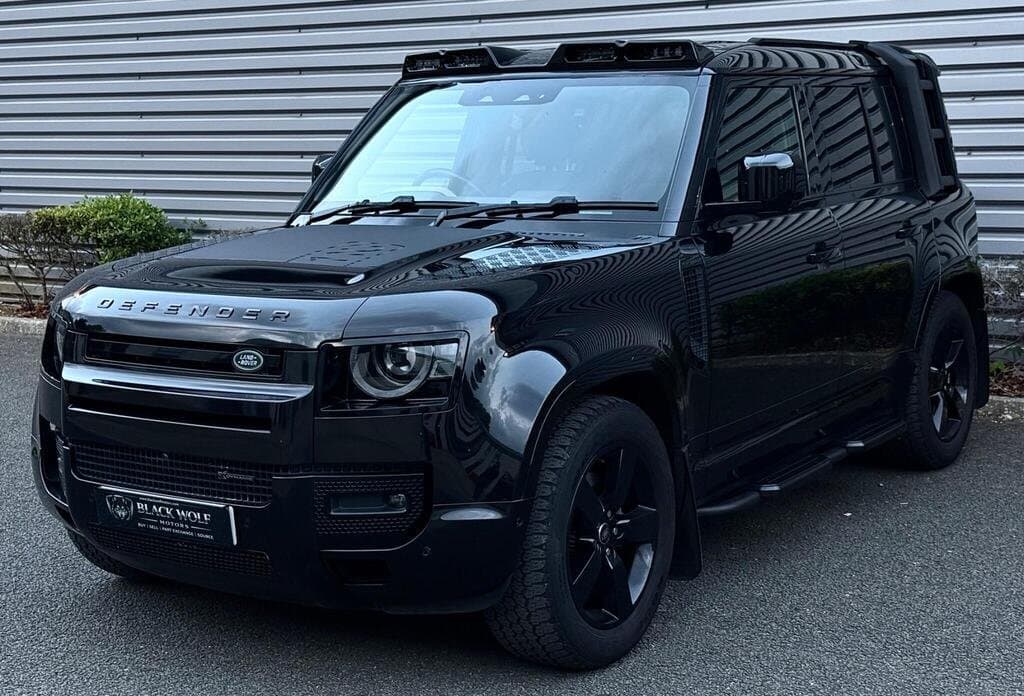 Land Rover Defender 110 X-Dynamic SE in Black, three-quarter front view, closer angle