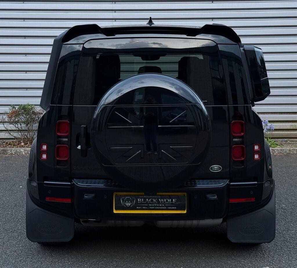 Land Rover Defender 110 X-Dynamic SE in Black, rear three-quarter view